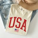 XL Ivory Cream USA Flag Patriotic American Pride Print Emblem With Bold Stars And Stripes Across The Banner Comfort Colors Tee