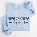 Medium Light Blue One Day At A Time Mental Health Wellness Hearts Supportive Wellbeing Message Sweatshirt