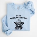 Small Light Blue Rambunctious Era Raccoon Meme Aesthetic Funny Pop Culture Icon Cozy Fleece Edition Sweatshirt