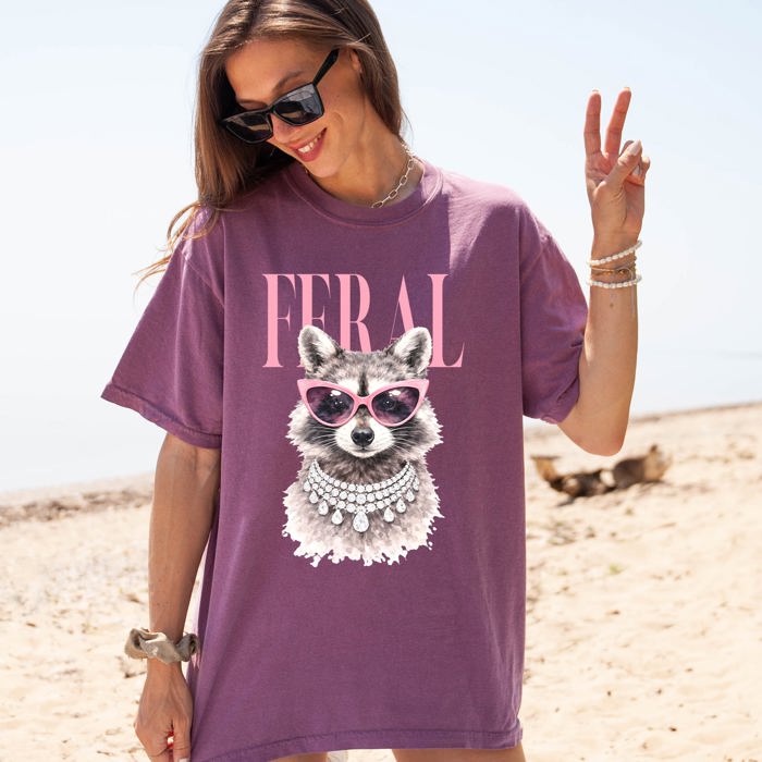 Feral Raccoon Fashion Forward Coastal Vibe With Playful Style And Sunset Seaside Adventure Comfort Colors Tee
