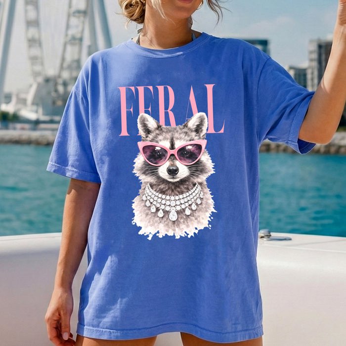 Feral Raccoon Fashion Forward Coastal Vibe With Playful Style And Sunset Seaside Adventure Comfort Colors Tee