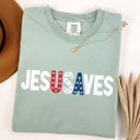 Medium Bay Light Sage Jesus Saves USA Patriotic Independence Day America Gospel Message Comfort Colors Tee