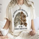 Medium Ivory Cream Find Someone Who Grows Flowers Skeleton Cowgirl Graphic Illustration Comfort Colors Tee