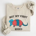 XL Sand Not My First Rodeo Cowboy Armadillo Western Themed Rustic Graphic Illustration Sweatshirt