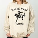 Small Sand Not My First Rodeo Cowboy Country Cowgirl Vintage Western Pride Graphic Sweatshirt