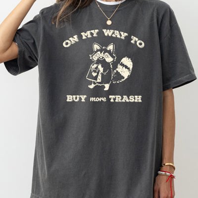 On My Way To Buy More Trash Raccoon Shopping Humorous Quirky Nonsense Comfort Colors Tee