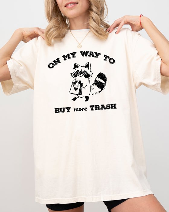 On My Way To Buy More Trash Raccoon Shopping Humorous Quirky Nonsense Comfort Colors Tee