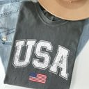Medium Pepper Dark Gray USA Flag Collegiate Varsity Olympics Patriotic Independence Day Fourth Of July America Comfort Colors Tee