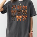 Medium Pepper Dark Gray Halloween Bows Girly Ribbons Coquette Spooky Autumn Fall Thanksgiving Comfort Colors Tee