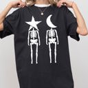 Large Black Mystical Couple Stars Moons Skeleton Halloween Spooky Night Sky Comfort Colors Tee