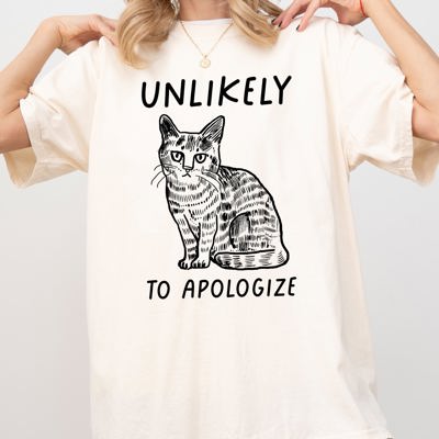 Unlikely To Apologize Cat Sarcastic Attitude Quote Graphic Premium Comfort Colors Tee