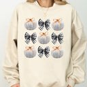 Medium Sand Halloween Ribbons and Pumpkins, Coquette Bows Graphic Sweatshirt