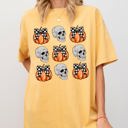 XXL Mustard Skulls and Checkered Pumpkins, Coquette Ribbons and Bows Halloween Edition Comfort Colors Tee