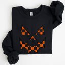 Small Black Spooky Jack-O-Lantern Retro Halloween Pumpkin Checkered Graphic Cozy Seasonal Sweatshirt