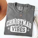 Small Pepper Dark Gray Christmas Vibes Snowflakes Retro Varsity Santa Snow Xmas Holiday Edition Vintage Style Comfort Colors Tee
