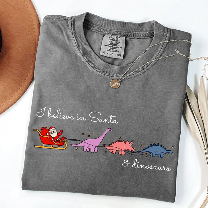 I Believe In Santa And Dinosaurs Sleigh Reindeer Christmas Winter Xmas Comfort Colors Tee