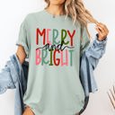 Medium Bay Light Sage Merry And Bright Colorful Christmas Winter Santa Claus North Pole Holiday Cheer For Everyone Comfort Colors Tee