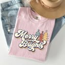 Large Blossom Light Pink Merry And Bright Colorful Retro Christmas Santa Winter Edition Comfort Colors Tee