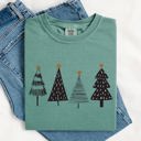 Large Light Green Minimalist Christmas Trees Winter Snow Santa Holiday Scene Nordic Winter Nights Cozy Atmosphere Comfort Colors Tee