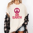 Medium Ivory Cream Peace On Earth Christmas Positivity Snow Santa Xmas Seasonal Joy Comfort Colors Tee