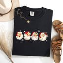 Large Black Retro Santas In A Row Christmas Winter Xmas Santas Holiday Parade Comfort Colors Tee