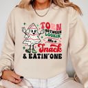 Large Sand Torn Between Looking Like A Snack And Eating One Christmas Cakes Santa Winter Xmas Sweatshirt