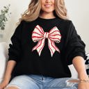 Medium Black Christmas Cake Bow Ribbon Coquette Santa Snow Winter Festive Cozy Holiday Sweatshirt