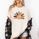 Medium Ivory Cream Thanksgiving Turkey Plaid Print Cute Autumn Patterns Vintage Cozy Rustic Graphic Comfort Colors Tee