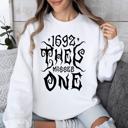 Large White 1692 They Missed One Salem Spooky Witch Halloween Night Edition Deluxe Cozy Graphic Sweatshirt