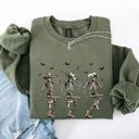 Large Military Green Dancing Cowboy Skeletons Halloween Bats Western Night Parade Cozy Graphic Sweatshirt