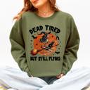 Medium Military Green Dead Tired But Still Flying Halloween Witch Motif With Spooky Moonlit Night And Cozy Vibes Sweatshirt