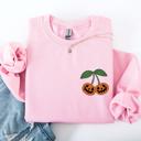 Small Light Pink Jack O Lantern Cherry Halloween Vintage Retro Cozy Autumn Night In Graphic Sweatshirt