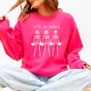 Large Crunhberry Bright Pink Let's Go Ghouls Skeleton Cheerleaders Halloween Night Parade Spooky Spirit Sweatshirt