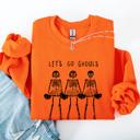 Medium Orange Let's Go Ghouls Skeleton Cheerleaders Halloween Night Parade Spooky Spirit Sweatshirt