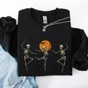 Small Black Skeleton Dancers Halloween Parade Vintage Moonlit Street Scene Cozy Retro Sweatshirt