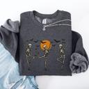 Large Dark Gray Heather Skeleton Dancers Halloween Parade Vintage Moonlit Street Scene Cozy Retro Sweatshirt