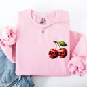 Medium Light Pink Spooky Skull Cherries Halloween Skeleton Stars Night Sky Ghosts Haunted Festival Scene Sweatshirt