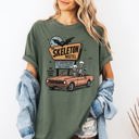 Large Moss Dark Green The Skeleton Motel Reading Skeletons Spooky Halloween Graphic Comfort Colors Tee