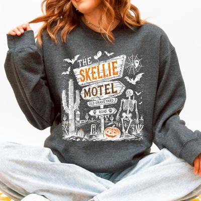 The Skellie Motel Skeleton Halloween Night Haunting Edition With Spooky Vibes And Retro Motel Aesthetic Sweatshirt
