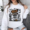 XL White The Skellie Motel Skeleton Halloween Night Haunting Edition With Spooky Vibes And Retro Motel Aesthetic Sweatshirt
