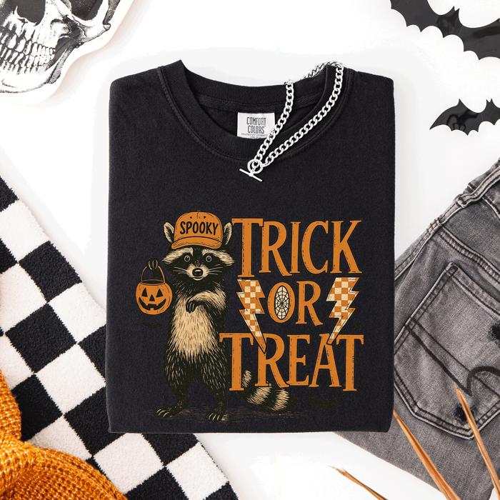 Trick or Treat Raccoon Halloween Mischief With Skeletons Ghosts Cats And Pumpkins Comfort Colors Tee