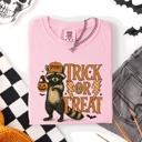 XXL Blossom Light Pink Trick or Treat Raccoon Halloween Mischief With Skeletons Ghosts Cats And Pumpkins Comfort Colors Tee