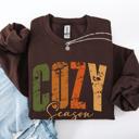 Large Dark Chocolate Cozy Season Fall Vibes Retro Varsity Autumn Pumpkin Floral Sunflower Motif Vintage Lettering Sweatshirt