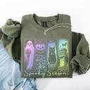 Medium Military Green Spooky Season Graphic Sweatshirt With Retro Halloween Pastel Ghost Design And Faux Denim Accent