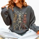 Medium Dark Gray Heather Halloween Dancing Skeletons Retro Leopard Checker Cherry Print Spooky Season Graphic Sweatshirt