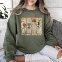Large Military Green Vintage Newspaper Ghost Halloween Book Cat Western Pumpkin Retro Spooky Costume Fall Graphic Sweatshirt
