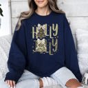 Large Navy Holly Jolly Christmas Camouflage Tree Santa Dalmatian Ribbons And Bows Cozy Holiday Sweatshirt