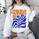 Small White Floral Design Featuring Bold Blues And Oranges Flowers And Nature Motif Sweatshirt