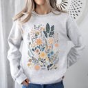  Whimsical Garden Floral Design With Delicate Petals And Lush Leaves And Blooms Sweatshirt