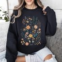 Medium Black Whimsical Garden Floral Design With Delicate Petals And Lush Leaves And Blooms Sweatshirt